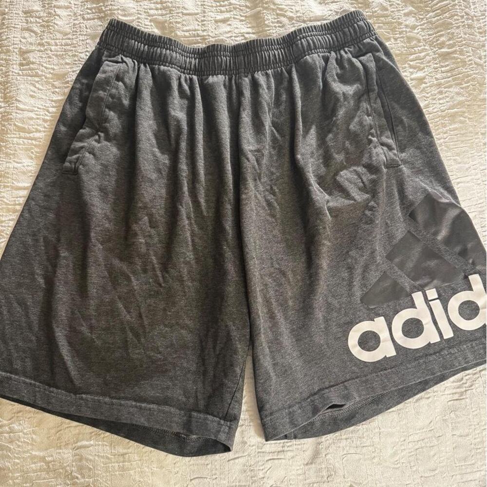 Gray adidas shorts with white